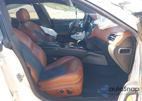 2019 Maserati Ghibli Granlusso z USA, uszkodzony, nr VIN ZAM57XSL2K1309902